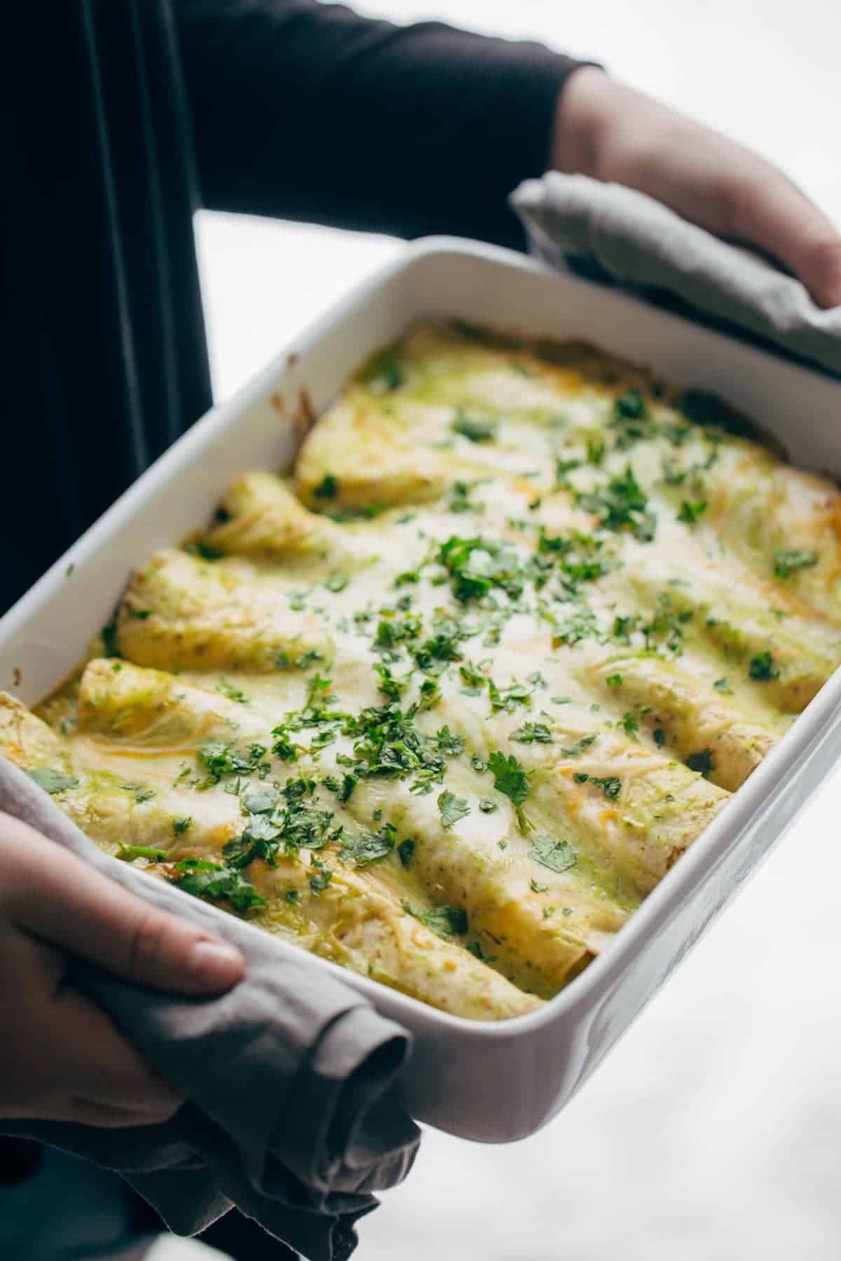 Breakfast enchiladas in a pan.
